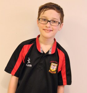 Declan in his Lagan College football kit.